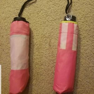 Two Victorias Secret Umbrellas